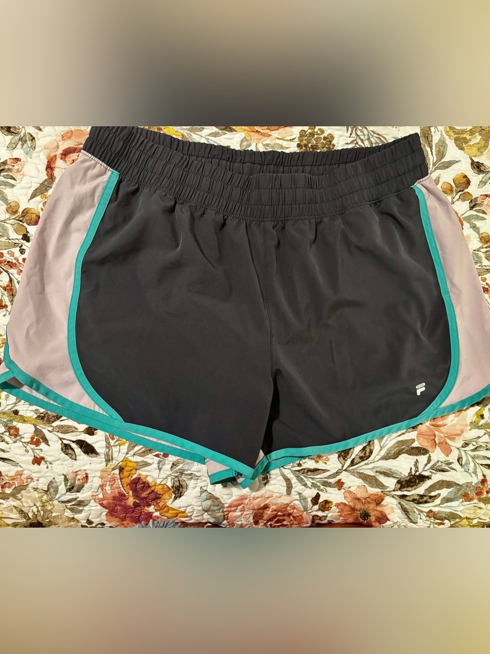 Fila Black Athletic Shorts with Teal Trim and Gray Panels
